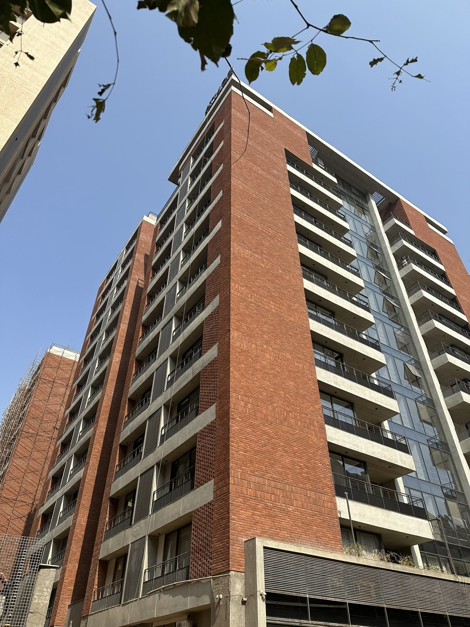 Finished exposed brick tower at Atmos by Solaire